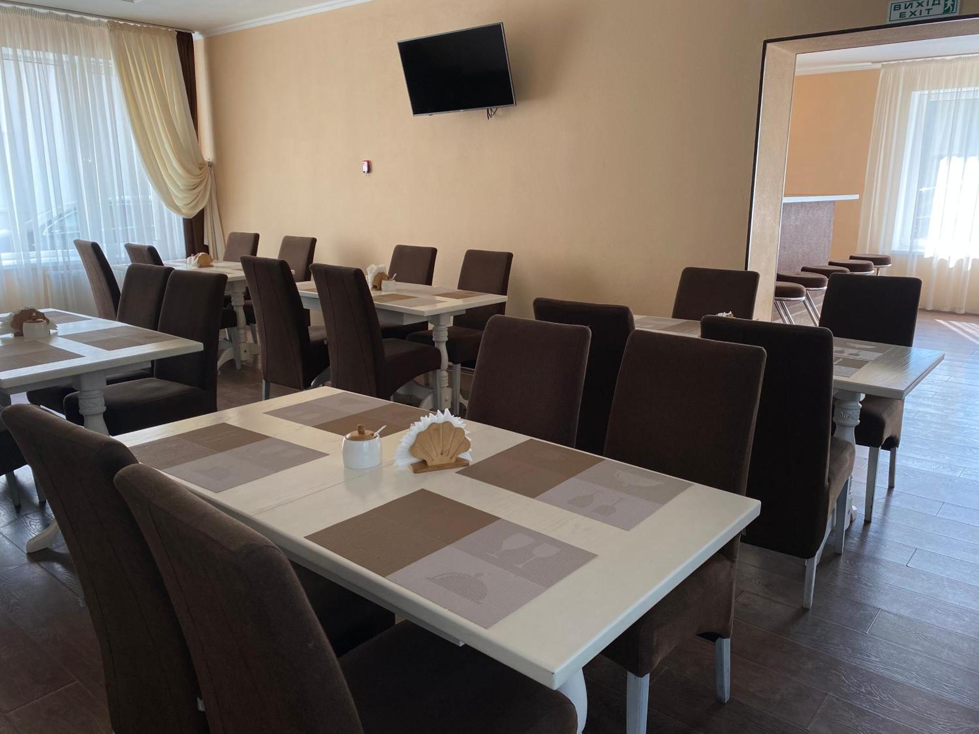 Hotel Орхідея à Romny Extérieur photo