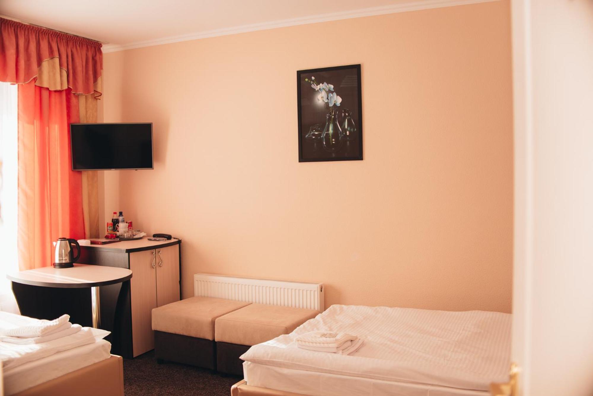 Hotel Орхідея à Romny Extérieur photo